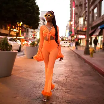 BKLD Seksualus Matyti Per Akies 2 dalių Rinkinys Moterims Vasaros 2019 Clubwear Plunksnų Pasėlių Viršų Ir Flare Kelnės Oranžinė Dviejų dalių Rinkiniai S-3XL