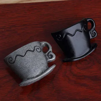 Derliaus kūrybos kavos puodelį, stalčių spintelės rankenos išsitraukia retro juoda odininkas durų rankenėlės rankenėles, antikvariniai sidabro baldų rankenėlės