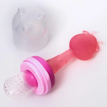 Nibbler su silikono akių ir silikono rankena, rožinė 4780634